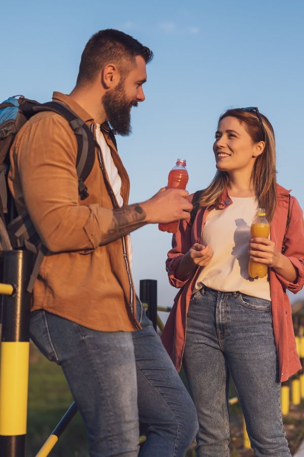image of a man and woman conversing outside