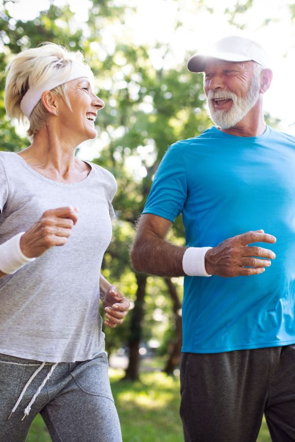 image of an older couple enjoying a run together